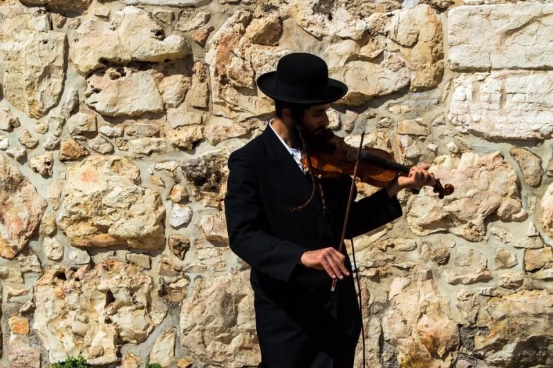 Orthodox Jew playing the violin